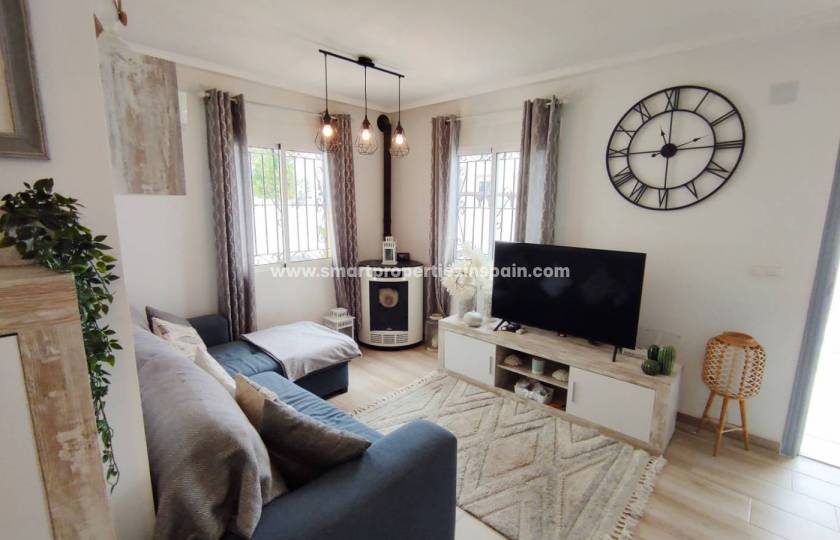 Are you looking for a sunny place to disconnect and a comfortable place to live? Our Semi Detached Villa for sale in La Marina Urbanization will captivate you