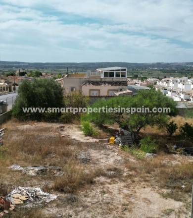 Build the house of your dreams on this plot for sale in La Marina Urbanization