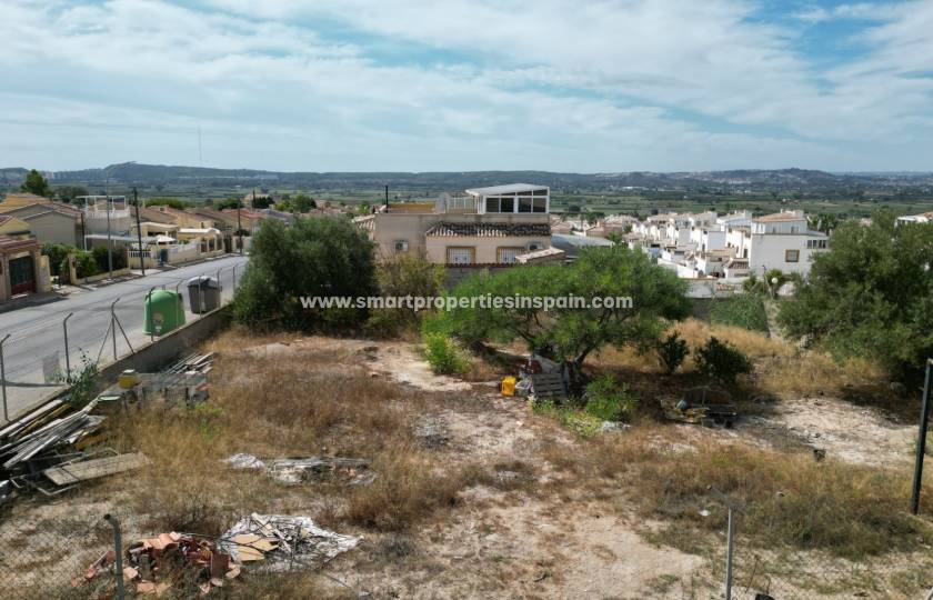 Build the house of your dreams on this plot for sale in La Marina Urbanization