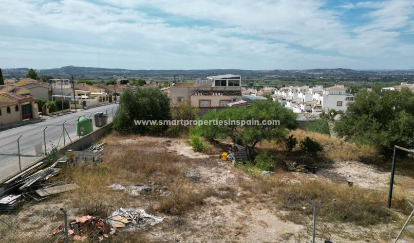 Build the house of your dreams on this plot for sale in La Marina Urbanization